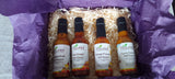 Load image into Gallery viewer, Flauriel Assorted Hot Sauce Gift Box - Sugar Town Organics