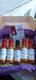 Load image into Gallery viewer, Flauriel Assorted Hot Sauce Gift Box - Sugar Town Organics